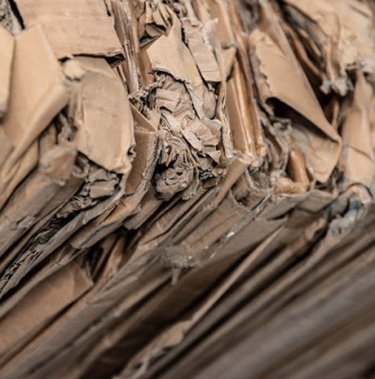 Welk type karton moet in de balenpers worden geplaatst